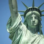 ‘Her meaning contains multitudes’: Why the Statue of Liberty is at the heart of US culture wars