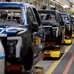 Ford takes $19.5 billion hit as it pulls back on electric vehicle plans, halts F-150 Lightning production