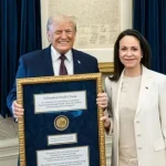Trump accepts Nobel medal from Venezuelan opposition leader Machado