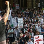 Australia police defend actions after violence at protest over Israeli president visit